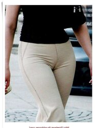 Walking with her cameltoe draping out