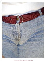 Walking with her cameltoe draping out