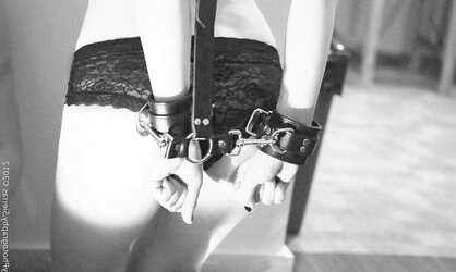 Strapped and handcuffed