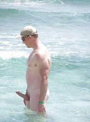 Caught erecting at bare beach