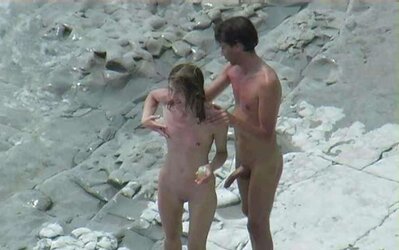 Caught erecting at bare beach
