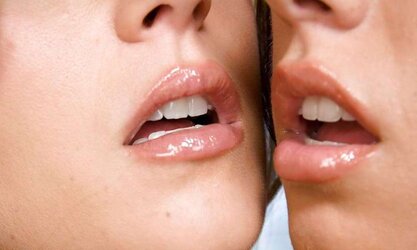 2 girls smooching