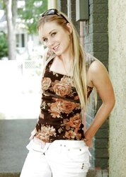 Blond teenager peels off outdoors on the steps