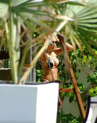 Vida Guerra displays astounding caboose and breasts in panty swimsuit