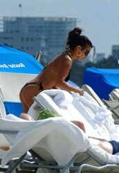 Vida Guerra displays astounding caboose and breasts in panty swimsuit