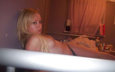 Stolen Images - Light-Haired Lady with smallish Bra-Stuffers