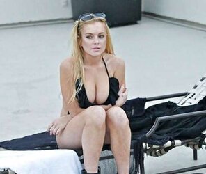 Lindsay Lohan ... In Taut Ebony Bathing Suit