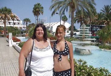 Mom clothed with ample knockers.