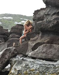 Shauna Sand having romp on the beach of St, Barth