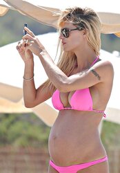Steamy Pregnant Celeb Michelle Hunziker in Bathing Suit three German