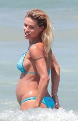 Steamy Pregnant Celeb Michelle Hunziker in Bathing Suit three German