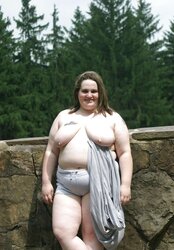 Kaylee outside in grey cut-offs