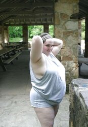 Kaylee outside in grey cut-offs