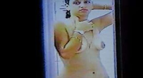 Voyeured thru window showering