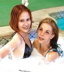 2 teenie dolls in a soapy pool
