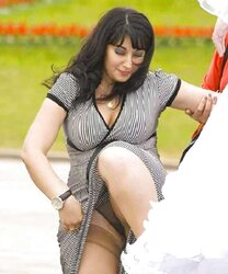 Public upskirt of russian doll at soiree (Camaster)