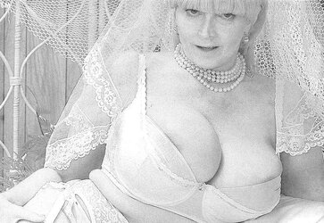 Vintage adult movie star Candy Samples in bridal garment