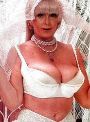 Vintage adult movie star Candy Samples in bridal garment