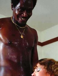 Blessed gal gargling the jism from a BIG BLACK COCK