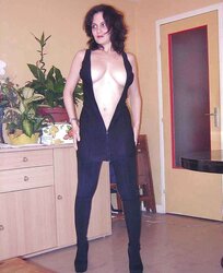 Inexperienced MUMMY Posing In Tights And High High-Heeled Slippers by DarKKo