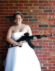 Bare lady with guns
