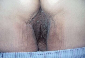 Leaned over in cut-offs and flashing rump