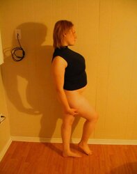 Grosse rousse aux gros seins
