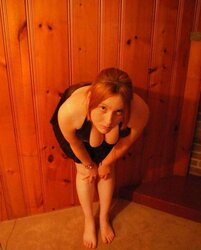 Grosse rousse aux gros seins