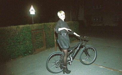 Honeys railing bicyles in high high-heeled slippers