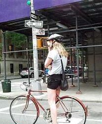 Honeys railing bicyles in high high-heeled slippers