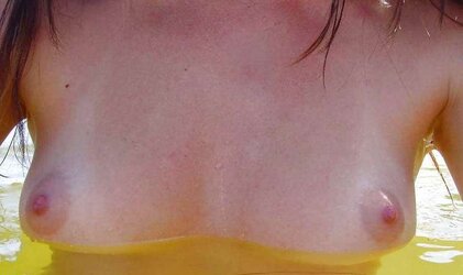 Fantastic Light-Haired Takes Photos Of Herself On Beach