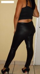 Latina in leggings unclothes