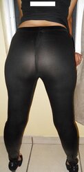Latina in leggings unclothes