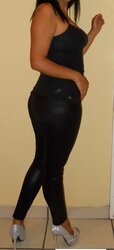 Latina in leggings unclothes