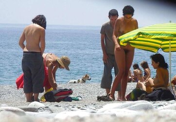 Beach disrobing, disrobing or getting bare