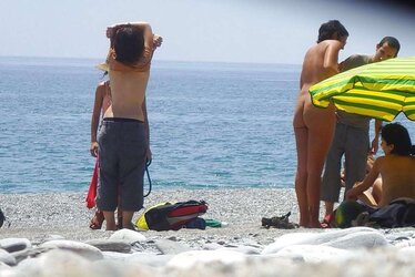 Beach disrobing, disrobing or getting bare