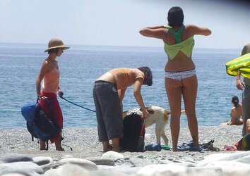 Beach disrobing, disrobing or getting bare