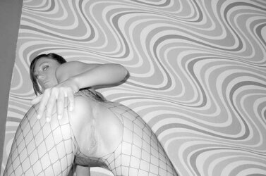 Super-Hot Stunner in Fishnet Figure Suit