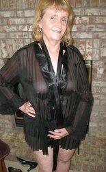 Granny in underwear dark-hued