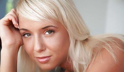 Light-Haired freckled Emma posing her molten nude bod