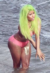 Nicki Minaj wears a pinkish bikin