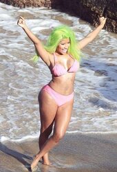 Nicki Minaj wears a pinkish bikin