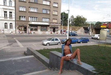 Suntanned female bare outdoors
