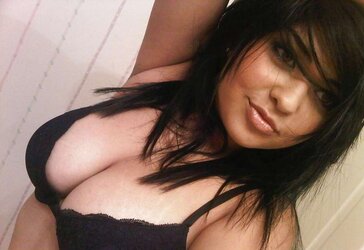 Big-Chested Stunner takes some selfshots