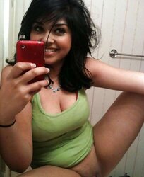Big-Chested Stunner takes some selfshots