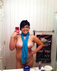 Big-Chested Stunner takes some selfshots
