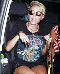 Miley Cyrus Magnificent slide upskirt shopping in London July
