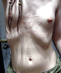 Piercings,mods,tattoos and sexyness