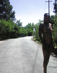 Dark-Hued sweetheart posing bare outside and in public