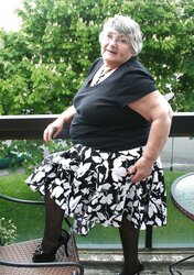 Libby in high-heeled slippers and pantyhose